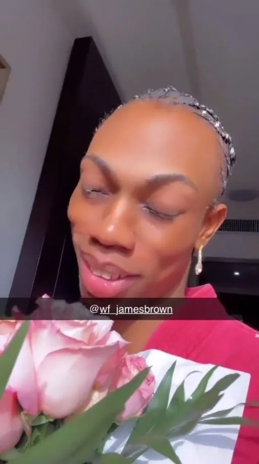 Crossdresser, James Brown, gushes after receiving flowers from a male admirer (video)