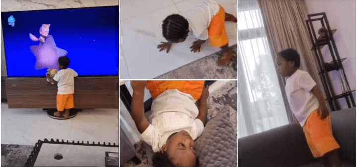 Davido’s Ifeanyi stands on N68m TV in Singer’s mansion as he watches cartoon, Fans Reacts