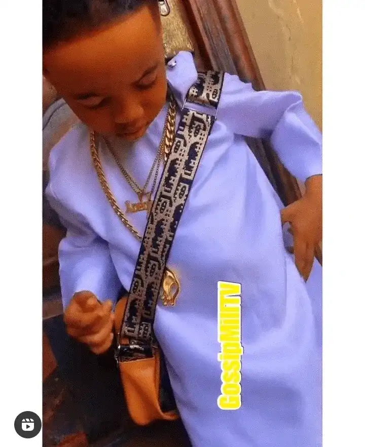 "Where Did He Get The Money" Little Boy Spark Reactions as He show off His Dyed Hair, Pierced Ears With Big Expensive Jewelry (Video)