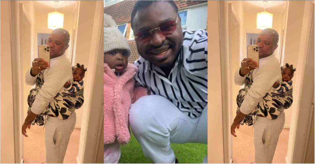 UK will humble you – drama as Nigerian man forced to back baby after wife left for work