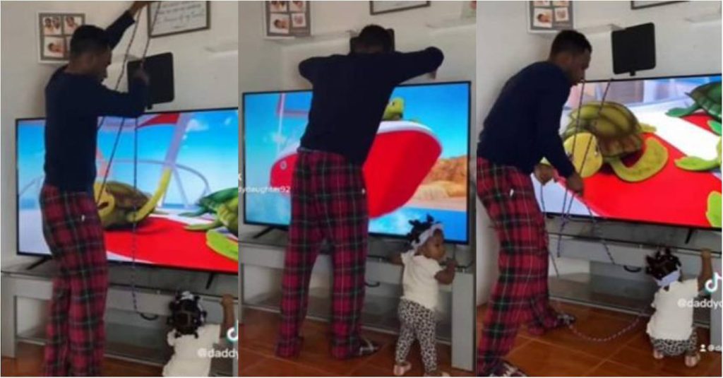 Funny dad ties TV with rope out of Frustration as His baby wants to break it by all means [watch]