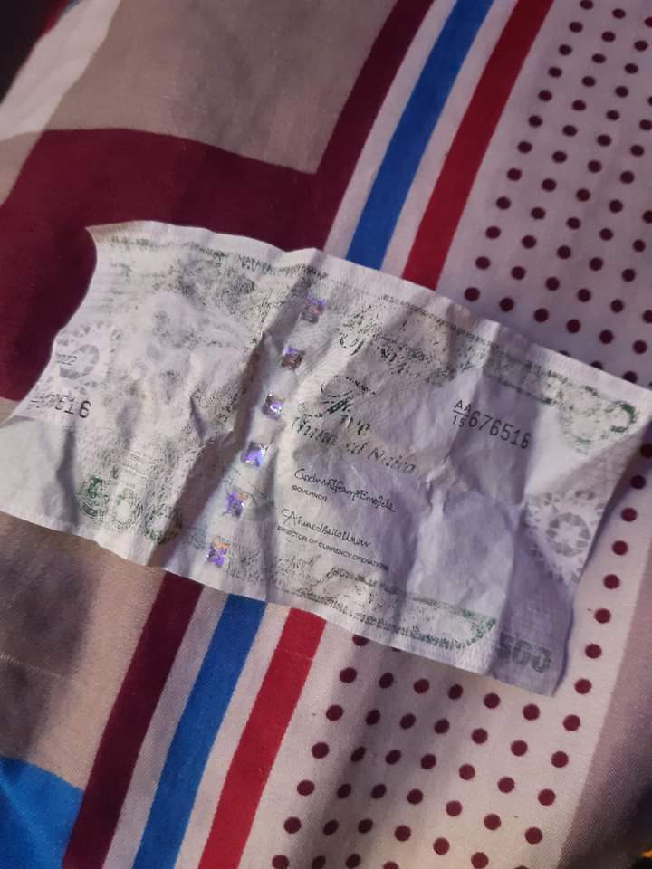 "Can We Say They Paint Our New Naira Note"– Lady Stir Reaction As She Shows New Naira Note Which Faded After Unknowingly Being Washed In Clothes