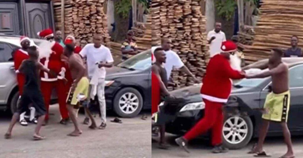 "Hungry Man Santa"– Drama As Residents Intervene In Father Christmas Fights With Agbero On The Street (Video)