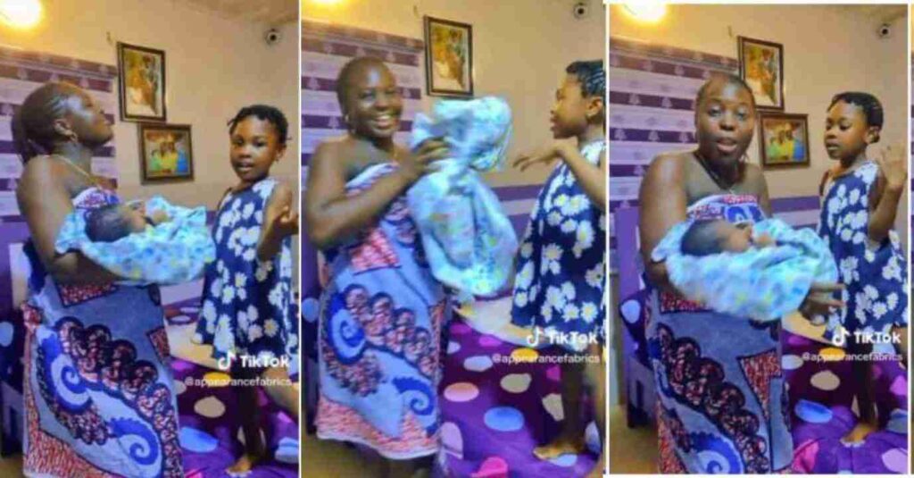 “Today is My Happiest Day, our Baby Naming Ceremony”: Over Excited Nigerian Mum in Wrapper Dances with Her Newborn in video