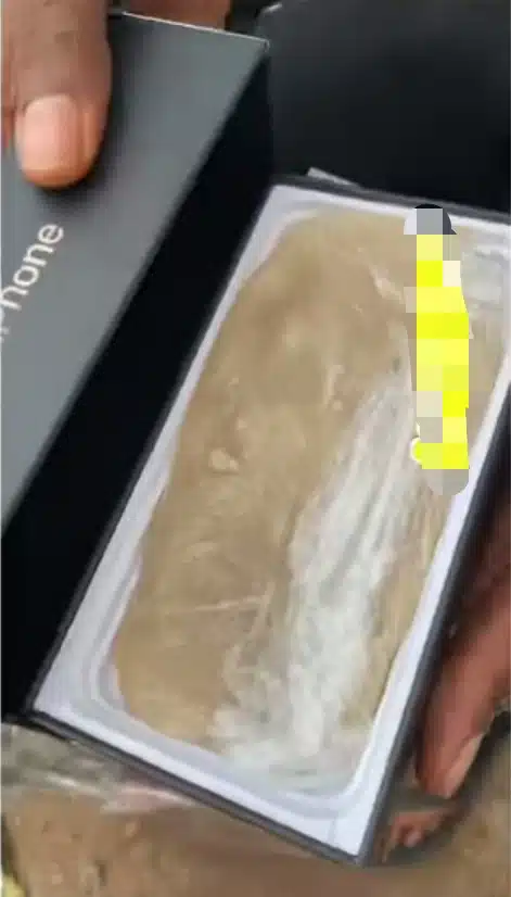 "Na loan I collect to buy the phone"- Man cries in pain after buying iPhone 15 only to discover fufu inside (Video)