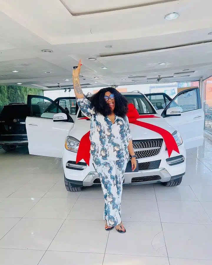 “One of my toughest years, but God blessed me” – Nkechi Blessing gifts herself a brand new car for Christmas (Video)