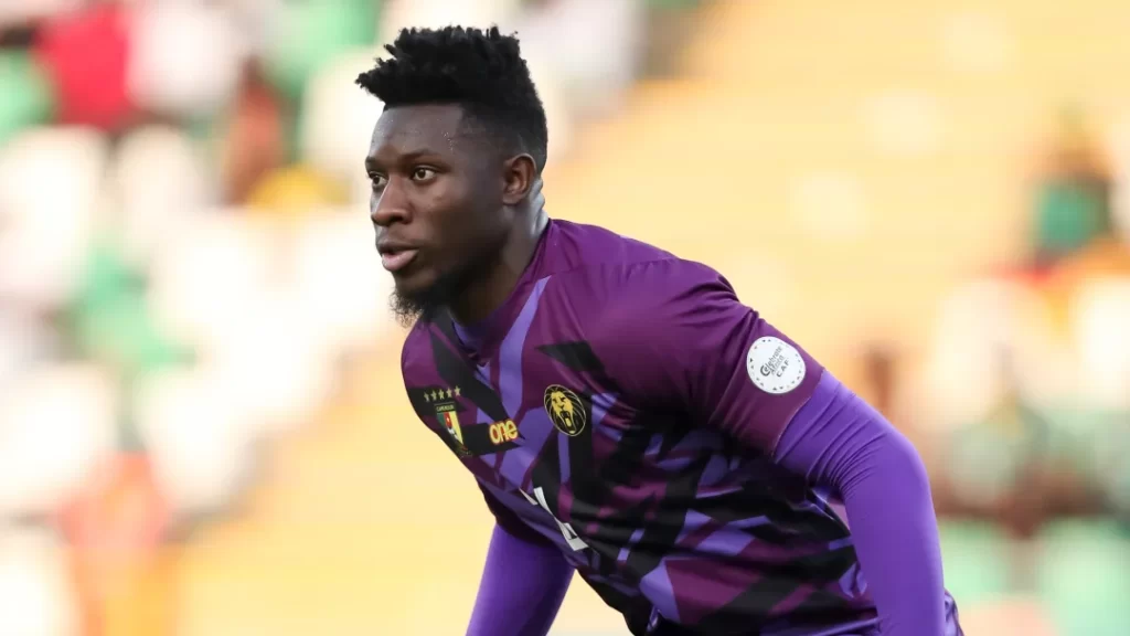 Andre Onana relegated to the bench as Cameroon narrowly qualify for the Africa Cup of Nations knockout stage.