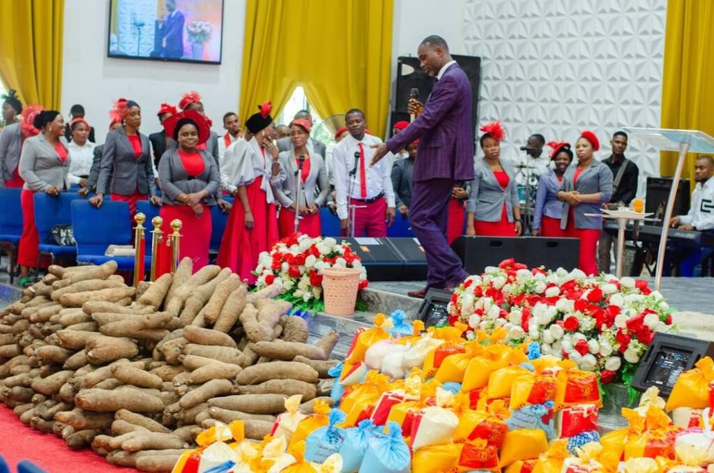 "A Beautiful Sunday to remember” – Pastor shares bags of rice and yams to members after church service (Photos)