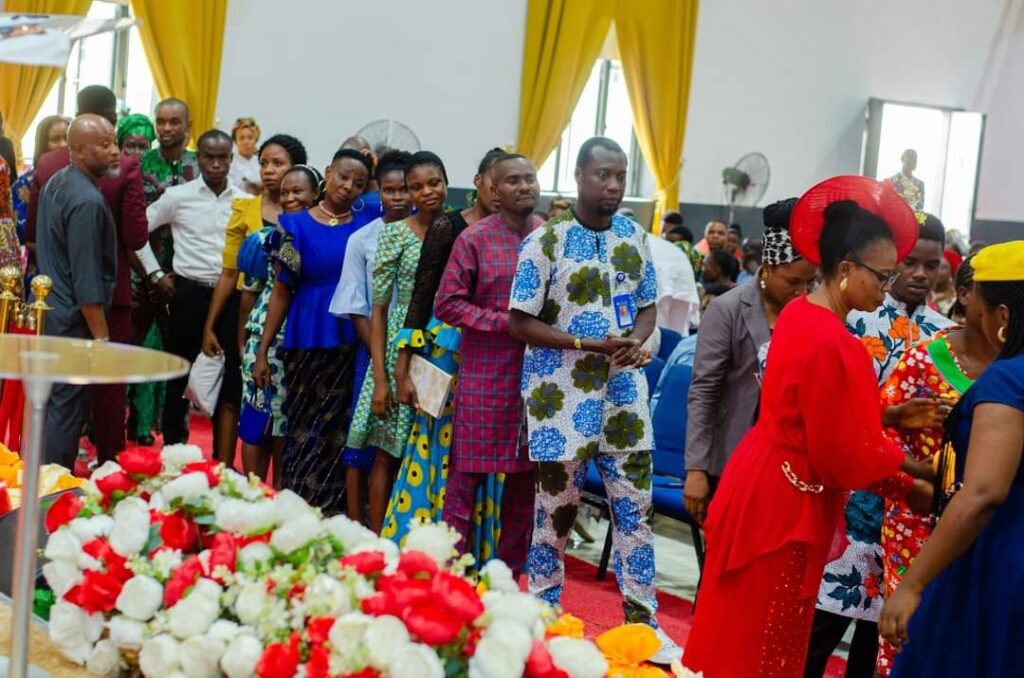 "A Beautiful Sunday to remember” – Pastor shares bags of rice and yams to members after church service (Photos)