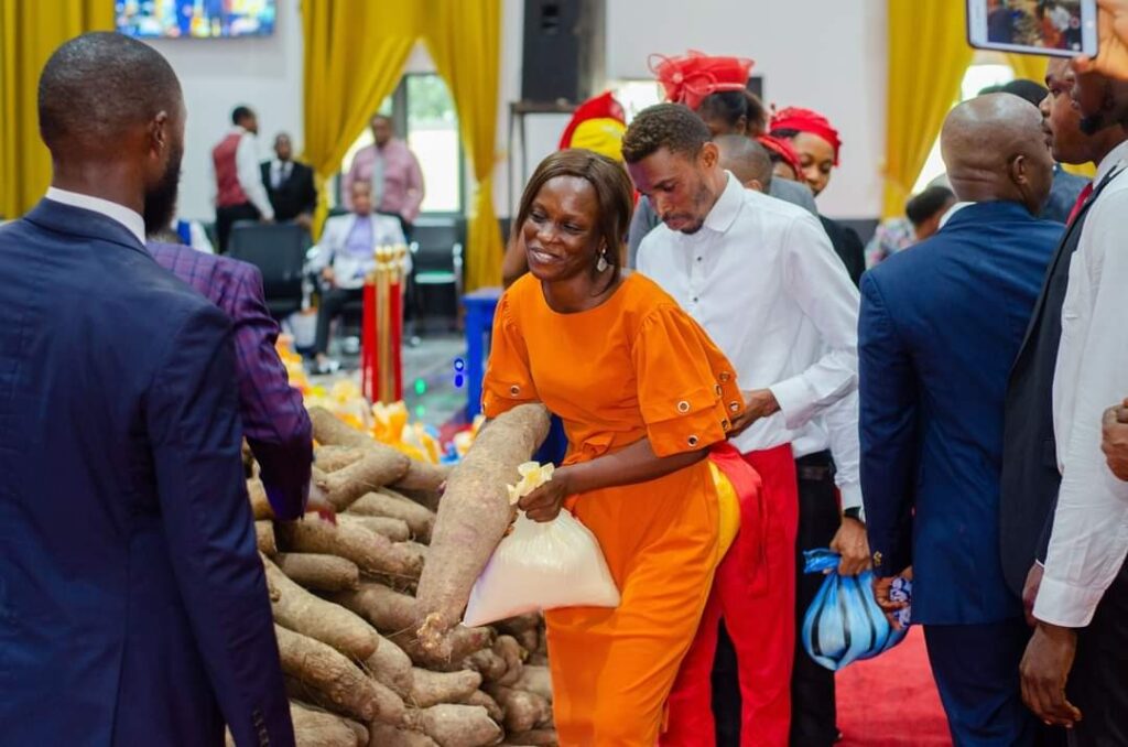 "A Beautiful Sunday to remember” – Pastor shares bags of rice and yams to members after church service (Photos)